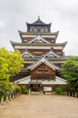 Old Hiroshima casle in Japan, on Otagawa river in summer.