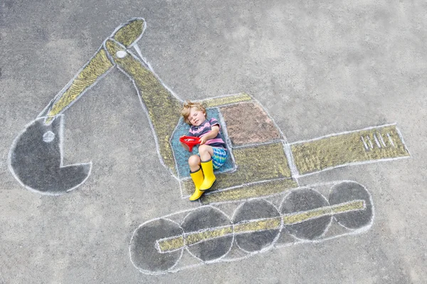 Funny little kid boy with excavator chalk picture — Stock Photo, Image