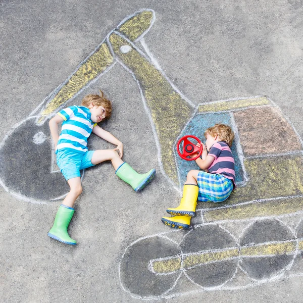 Two little kid boys with excavator chalk picture — Stock Photo, Image