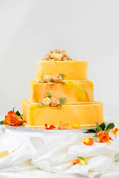 Wedding cake in yellow and orange.