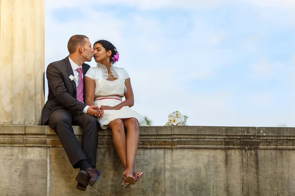 Beautiful indian bride and caucasian groom after wedding ceremon — Stock Photo, Image