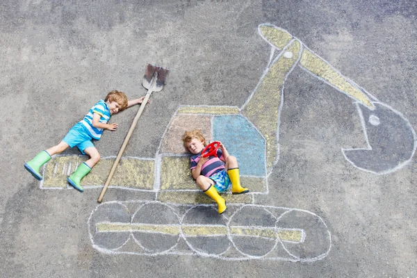 Two little kid boys with excavator chalk picture — Stock Photo, Image