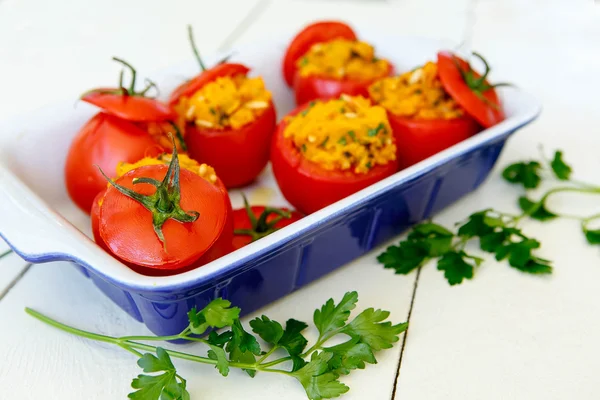 Stuffed tomatoes with sweet potato mash, pine nuts, parsley — Stock Photo, Image