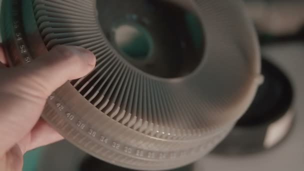 Holding a slide carosel for projector — Stock Video