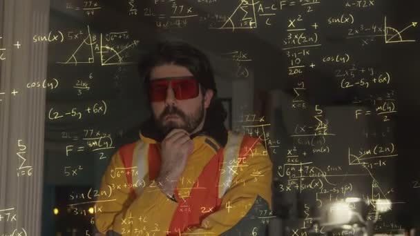 Futuristic guy doing math — Stock Video