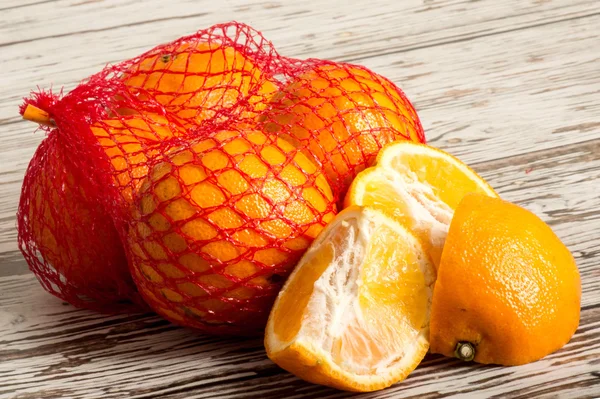 Bolsa de naranjas jugosas maduras frescas — Foto de Stock