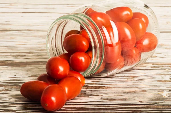 Glass Jar of Fresh Ripe Plumb Tomatoes — Stock Photo, Image