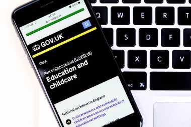 London UK, January 15 2021, Mobile Phone Or Smartphone Screenshot Of government Information On Covid-19 Education And Childcare