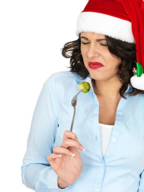 Noel Baba şapkası Brussel Filiz bir çatal kapalı yemek genç kadın