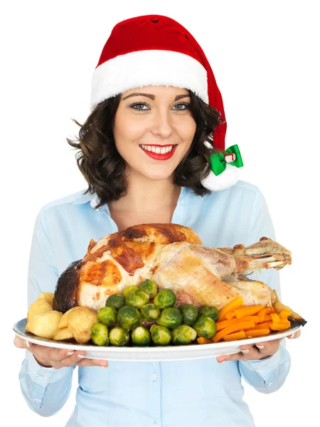 Young Woman in Santa Hat Holding Roast Turkey and Vegetables — Stock Photo, Image