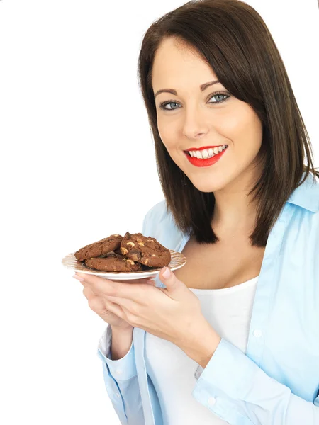 Young Woman Eating Biscuits — Stock Photo, Image