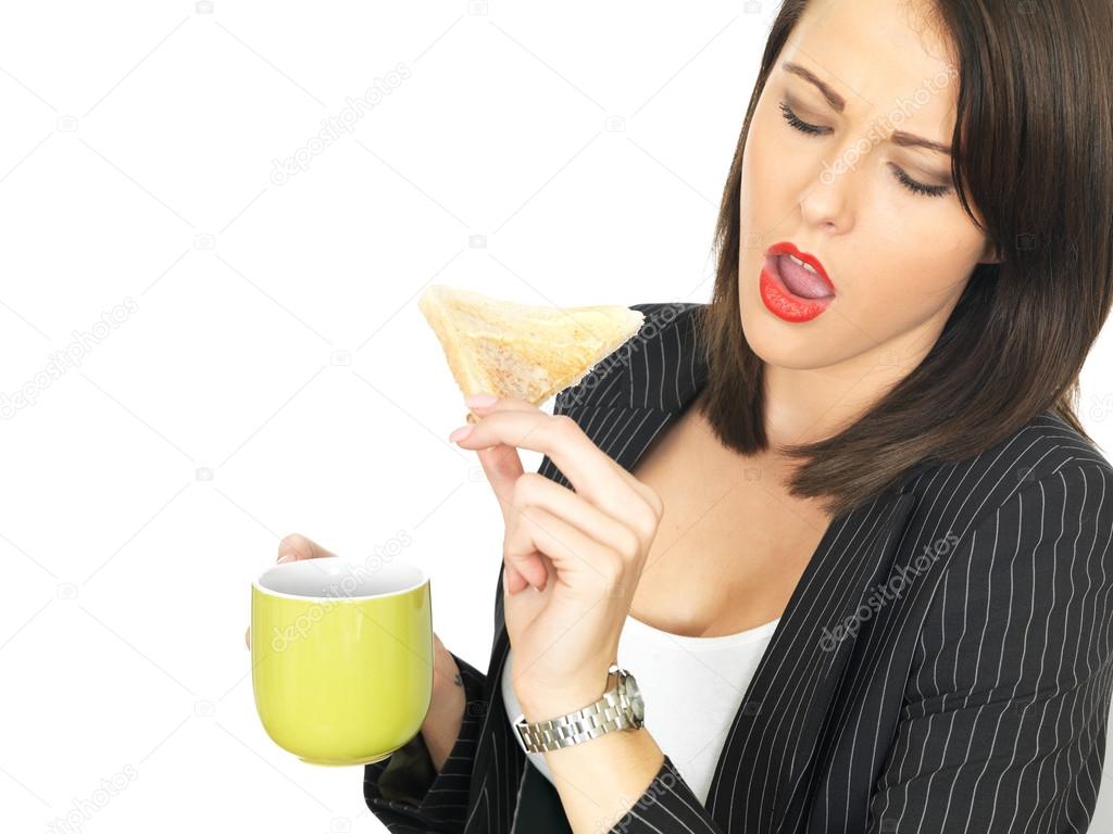 Young Business Woman with Coffee and Hot Buttered Toast