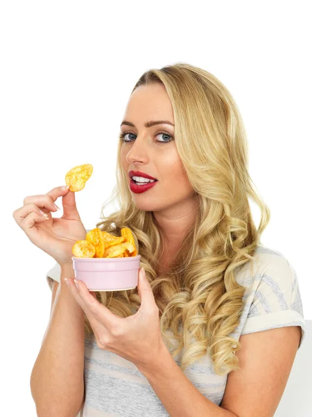 Young Woman Eating Potato Crisps — Stock Photo, Image