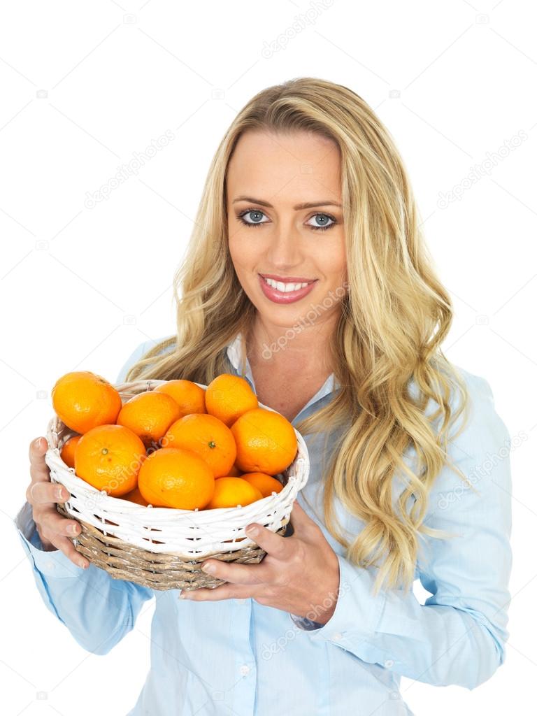 Young Woman Holding a Basket of Tangerines