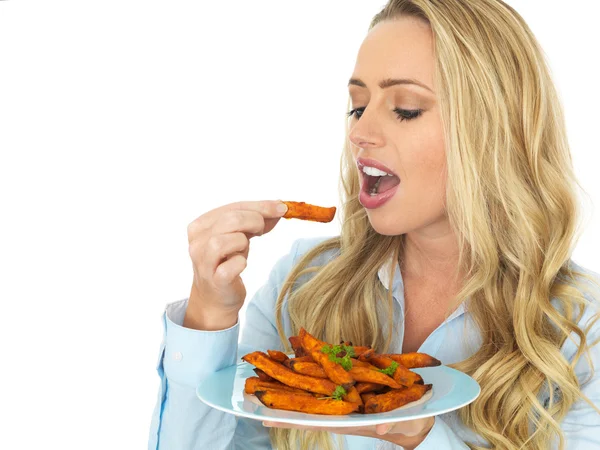 Young Woman Holding a Plate of Sweet Potatoes — Stock Photo, Image