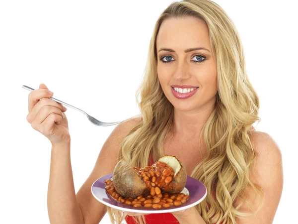 Young Woman Eating a Jacket Potato with Baked Beans — Stock Photo, Image