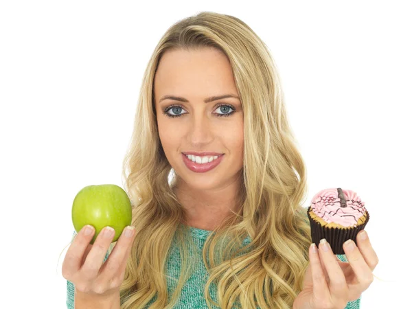 Young Woman Comparing Good and Bad Food — Stock Photo, Image