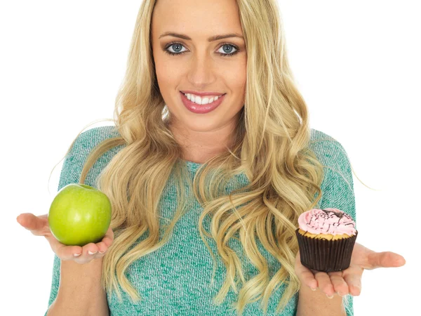 Young Woman Comparing Good and Bad Food — Stock Photo, Image