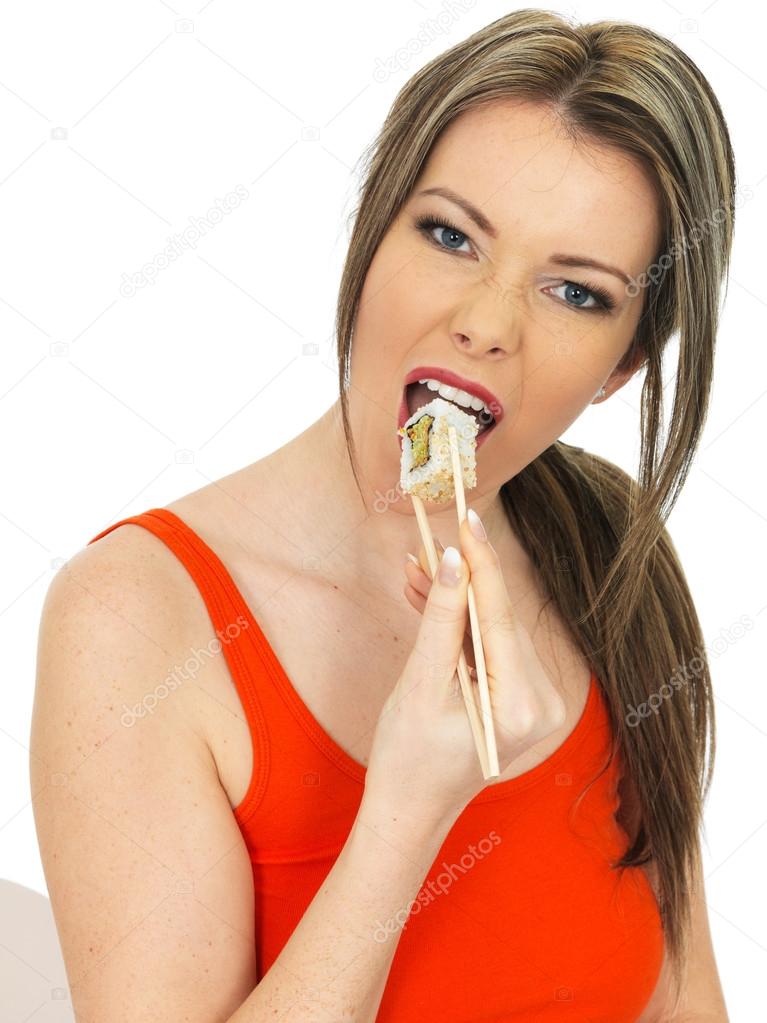 Young Woman Eating Sushi