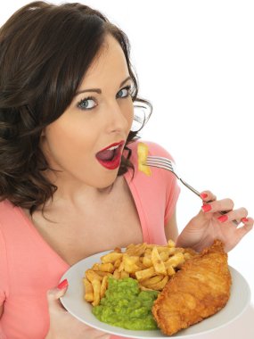 Young Woman Eating Fish and Chips with Mushy Peas clipart