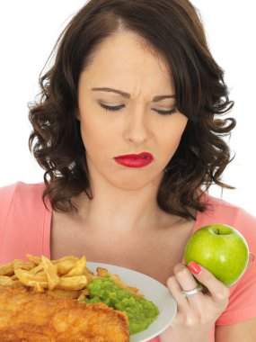 Young Woman Eating Fish and Chips with Mushy Peas clipart