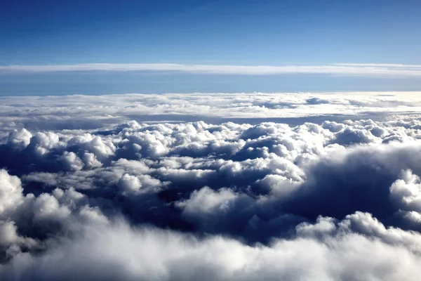 Looking Down at White Fluffy CLouds Against a Blue Sky — Stock Photo, Image