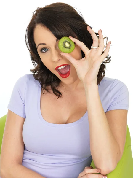 Young Woman Holding Fresh Ripe Kiwi Fruit — Stock Photo, Image