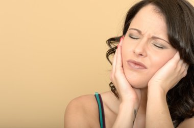 Attractive Young Woman With a Painful Toothache