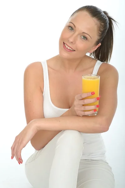 Healthy Happy Fit Young Woman Holding a Glass Of Fresh Orange Juice — 스톡 사진