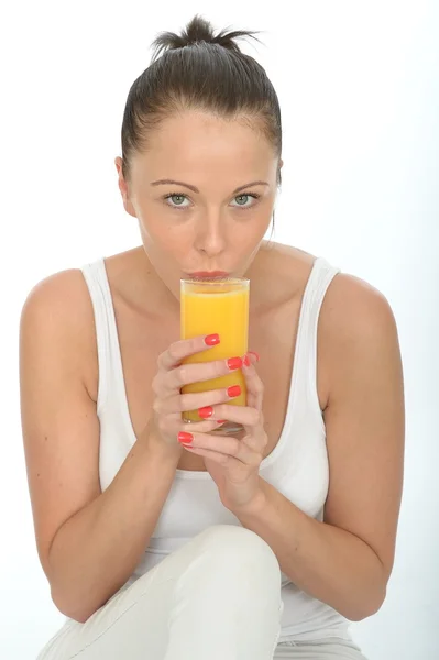 Healthy Happy Fit Young Woman Holding a Glass Of Fresh Orange Juice — 스톡 사진