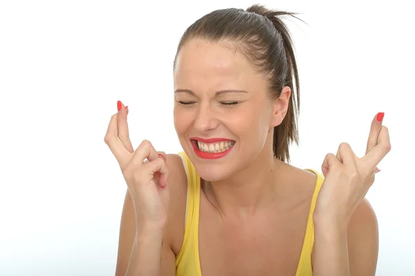 Portrait of a Happy Young Woman With Her Fingers Crossed — Stock Photo, Image