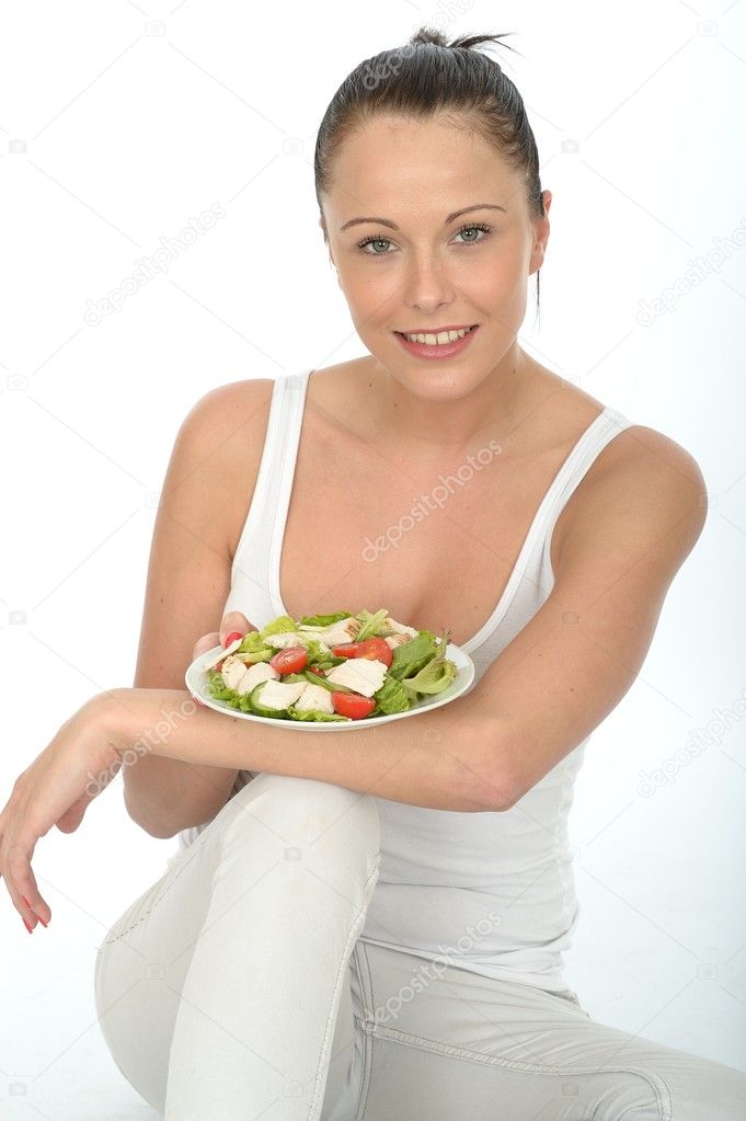 Healthy Young Woman Holding a Plate of Chicken Salad