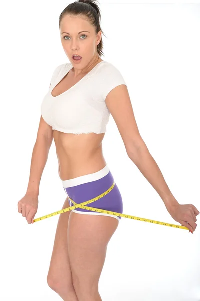 Healthy Young Woman Checking Her Weight Loss With a Tape Measure — Stock Photo, Image