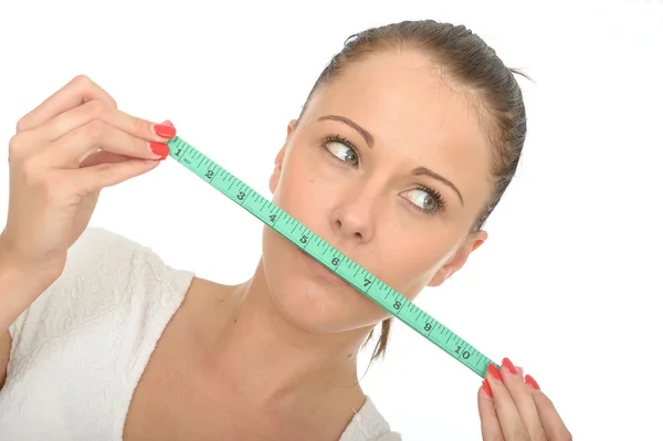 Healthy Young Woman Holding a Tape Measure — Stock Photo, Image