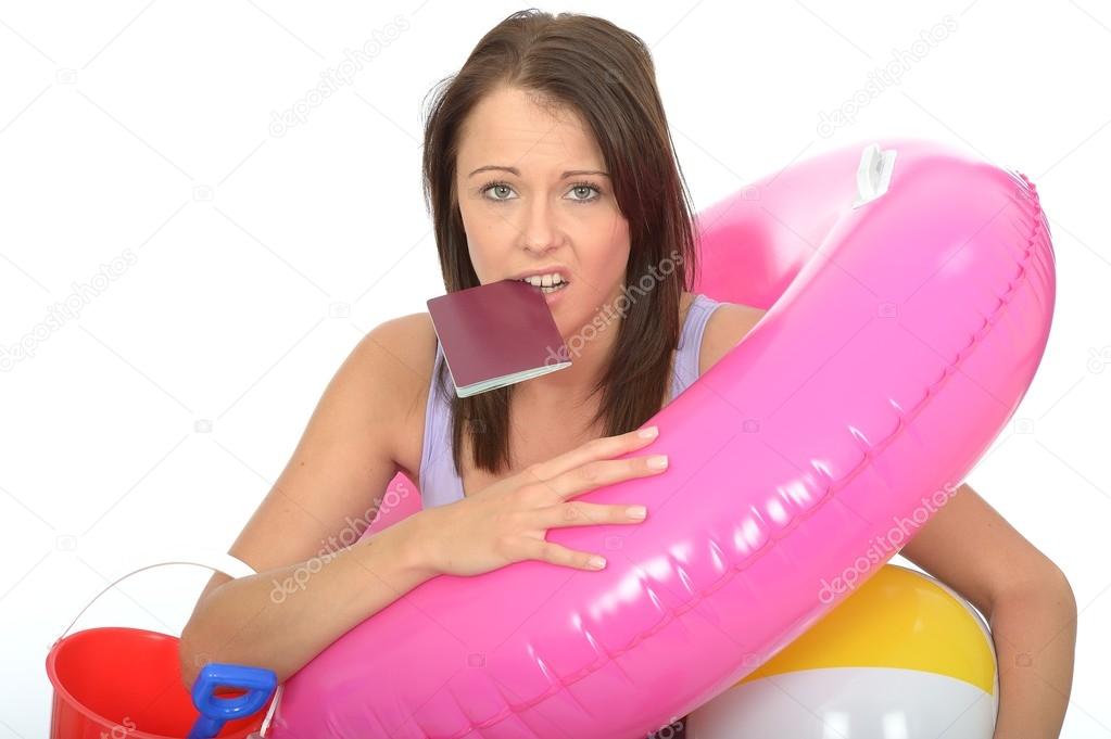 Worried Upset Young Woman Holding a Passport with a Pink Rubber Ring