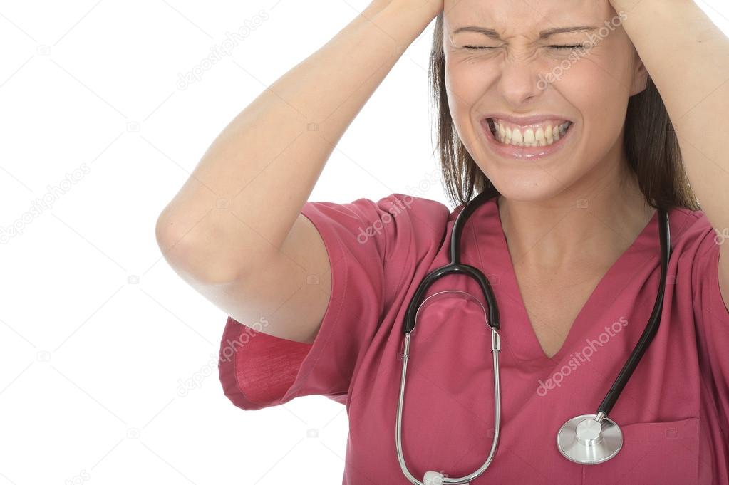 Very Stressed Beautiful Young Female Doctor In Her Twenties Pulling Her Hair