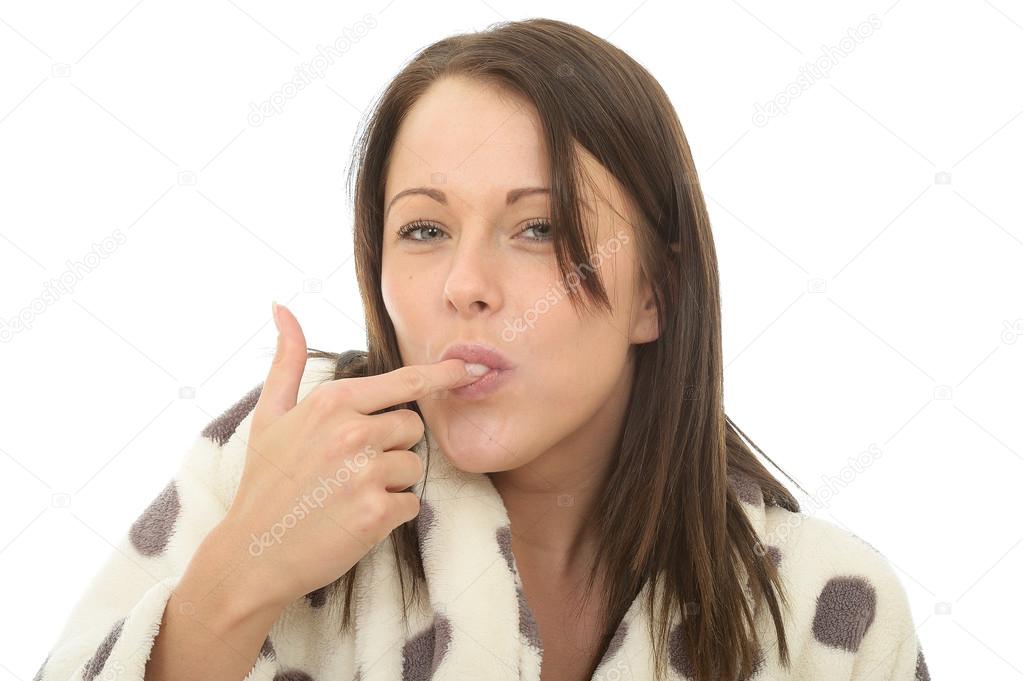 Attractive Happy Young Woman Sucking Her Finger