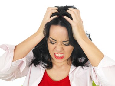 Portrait of a Frustrated Beautiful Young Hispanic Woman Pulling Her Hair clipart