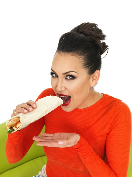 Beautiful Young Hispanic Woman With A Mexican Style Chicken Fajita Wrap — 图库照片