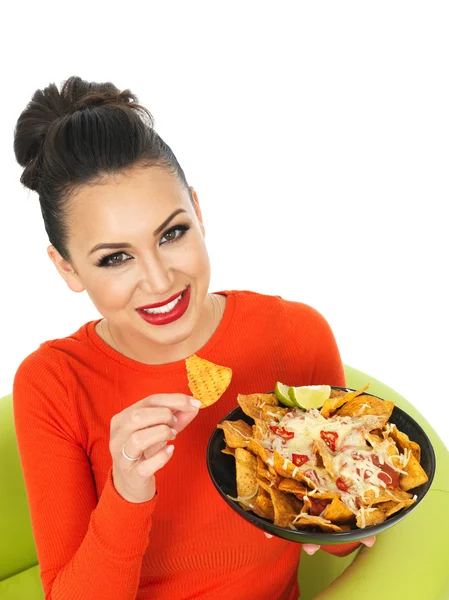 Beautiful Young Hispanic Woman With a Plate of Cheesy Nachos and Spicy Salsa Sauce — Stock Photo, Image