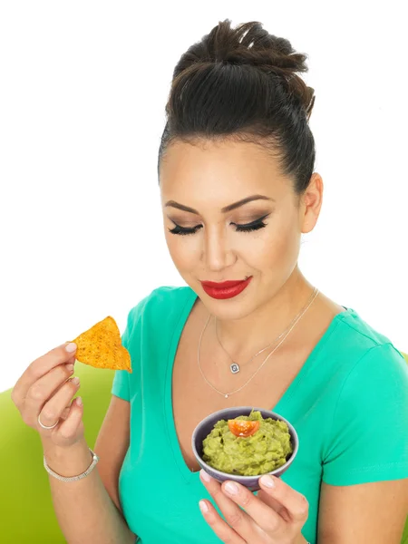 Beautiful Young Hispanic Woman Holding A Small Bowl Of Homemade Guacamole — Stock Photo, Image