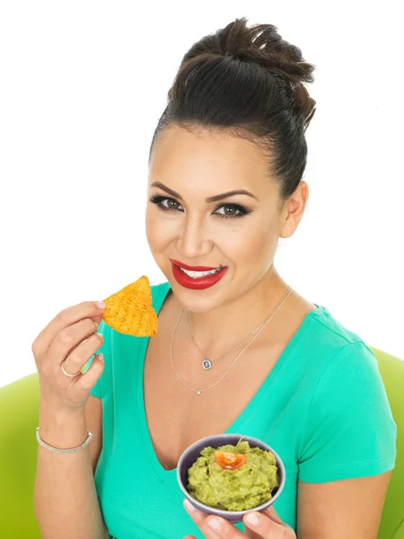 Beautiful Young Hispanic Woman Holding A Small Bowl Of Homemade Guacamole — Stockfoto