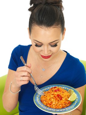 Beautiful Young Hispanic Woman Holding A Plate of Spicy Mexican Rice
