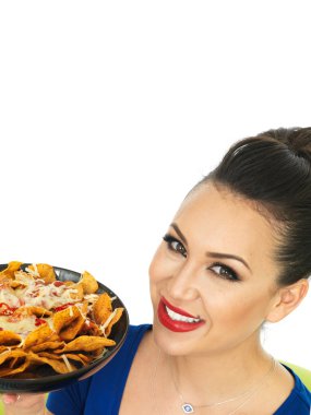 Beautiful Attractive Young Hispanic Woman Holding A Dish of A Dish of Nachoes