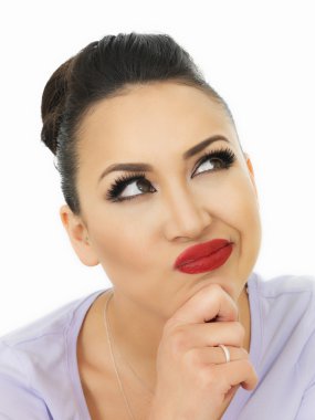 Portrait Of A Very Thoughtful Beautiful Hispanic Young Woman Contemplating and Thoughtful