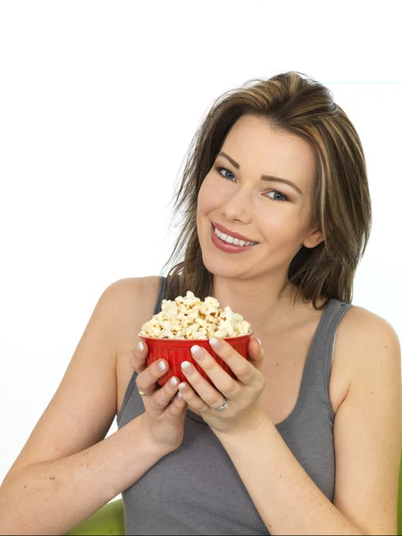 Attractive Young Woman Eating and Enjoying Popcorn — Stockfoto