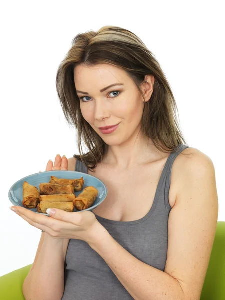 Attractive Young Woman Holding A Plate of Chinese Style Spring Rolls — Stock Photo, Image