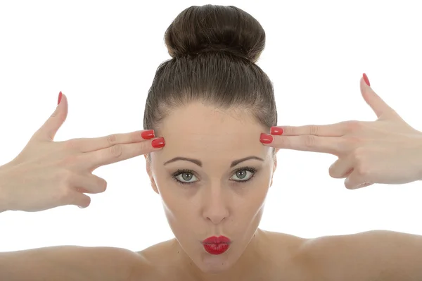 Beautiful Young Woman With Her Fingers Against Her Forehead As Make Believe Guns — Stok fotoğraf