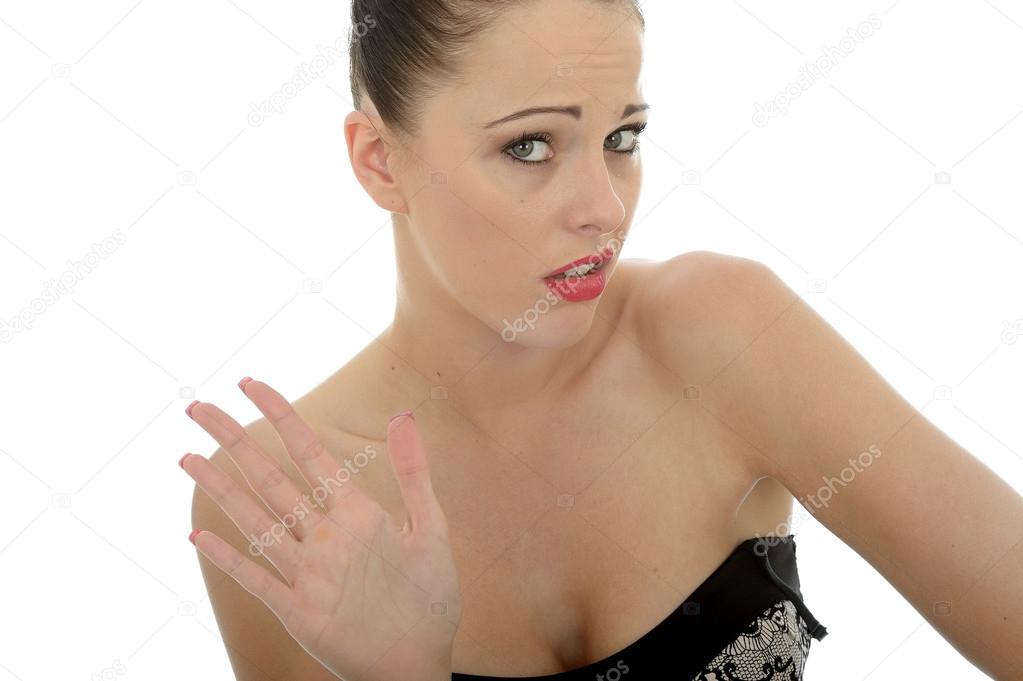 Young Woman Waving Away Someone in Bored Dispair and Disinterest