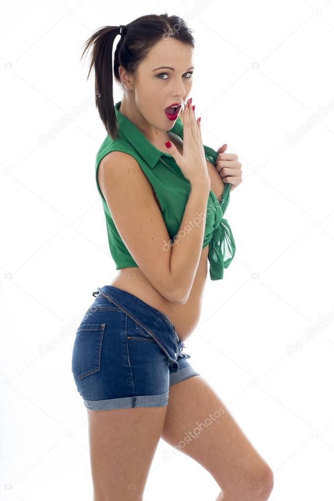 Sexy Young Pin Up Model Wearing a Green Tied Top And Blue Shorts